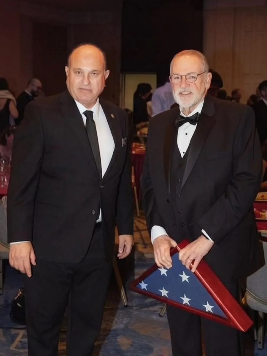Yoram Naor, Honorary Consul General and VP of the Ambassador Clubs of Israel, and US Ambassador Mike Huckabee at event by each other