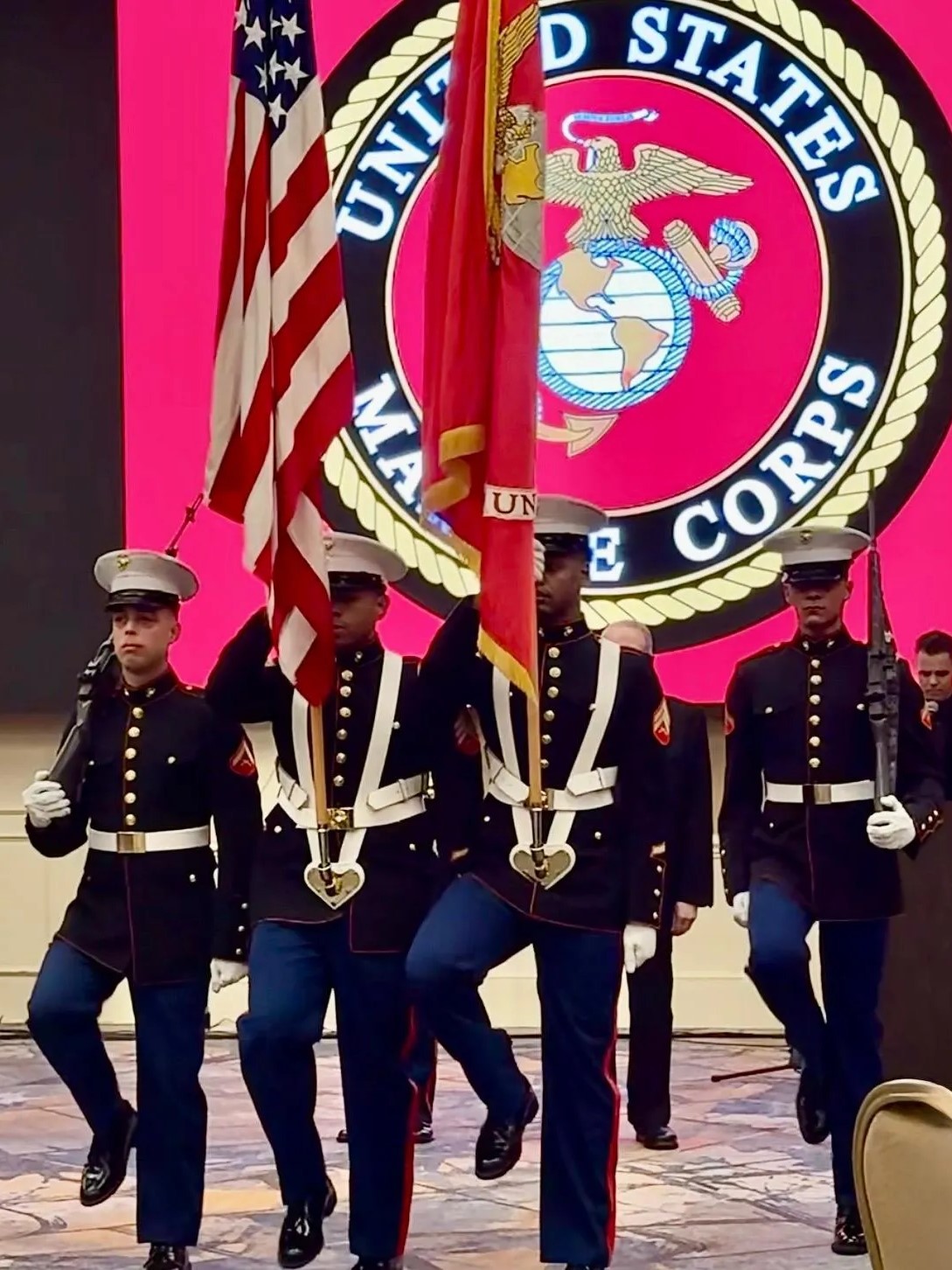 U.S. Marines marching in the 250th Anniversary of the U.S. Marine Corps event attended by Yoram Naor, Honorary Consul General and VP of the Ambassador Clubs of Israel, and US Ambassador Mike Huckabee.