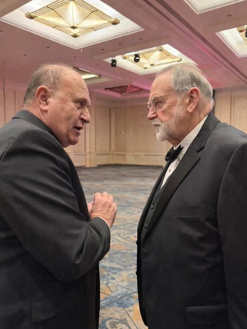 Yoram Naor, Honorary Consul General and VP of the Ambassador Clubs of Israel, and US Ambassador Mike Huckabee discussing